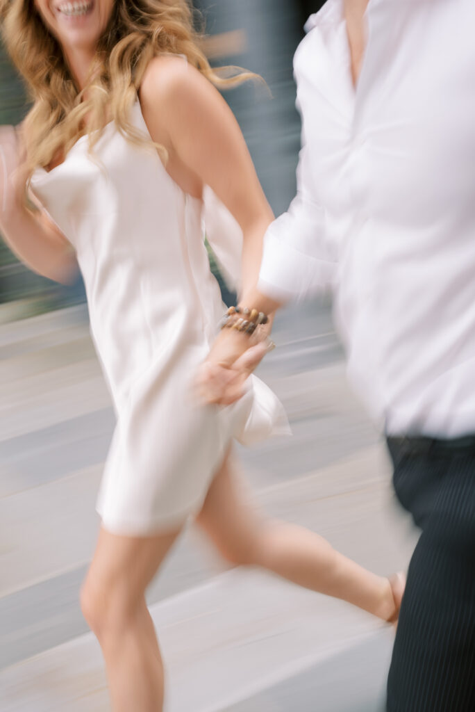 motion blur image of a couple running together