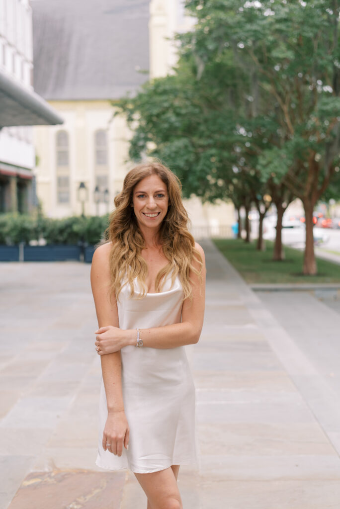 Portrait of a woman in a white slip dress