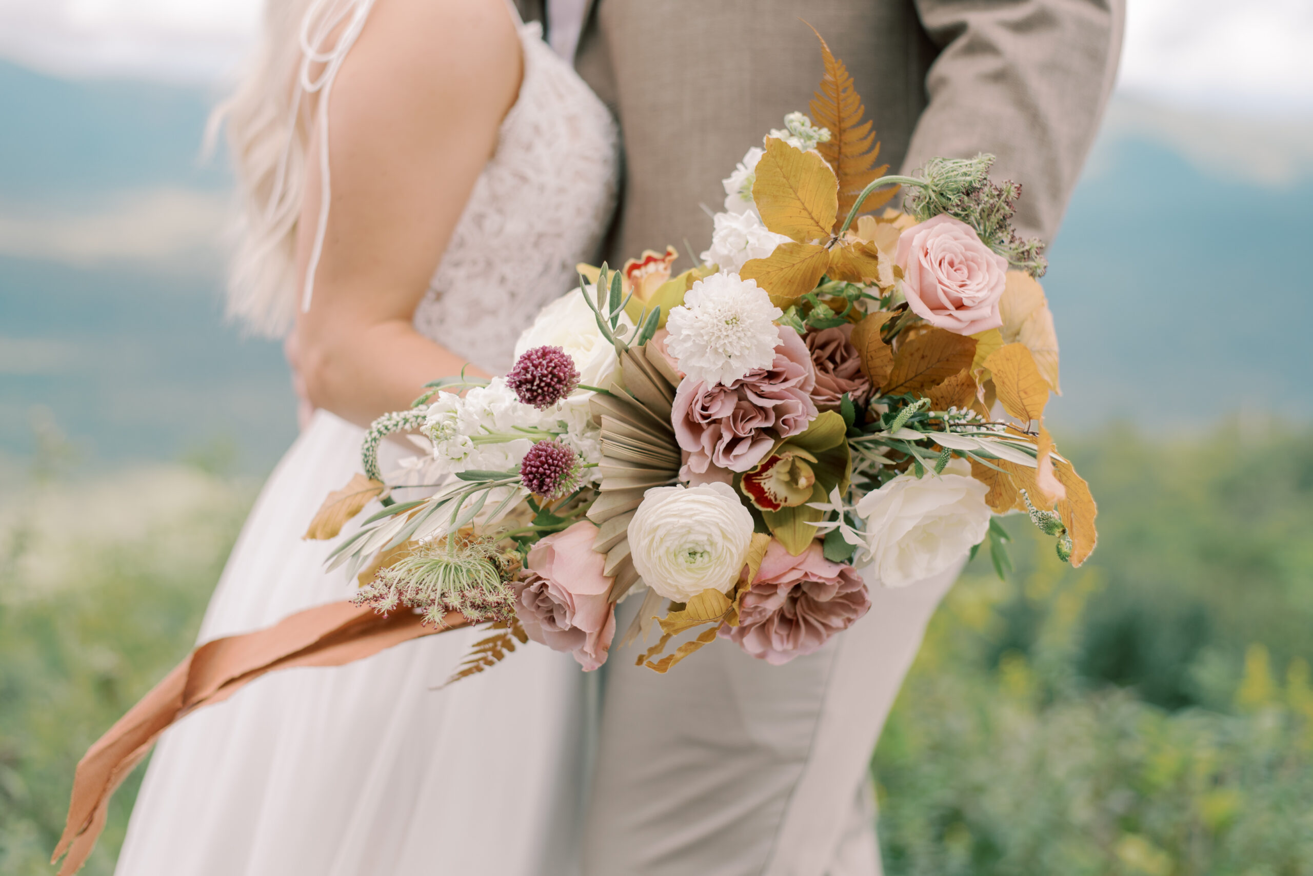 Autumn style elopement bouquet on a mountaintop