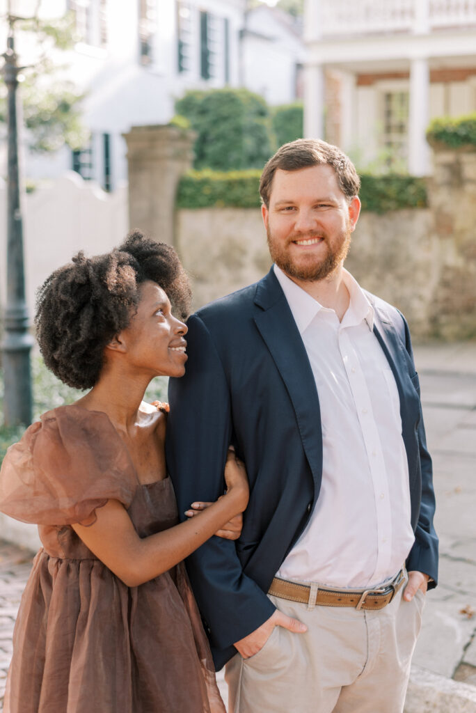 Couple smiling together during their engagement photos