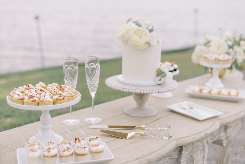 Dessert table for a small wedding with cake and tarts