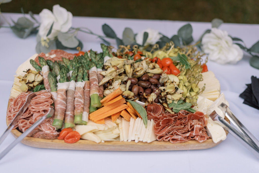 elaborate charcuterie board at an intimate wedding celebration